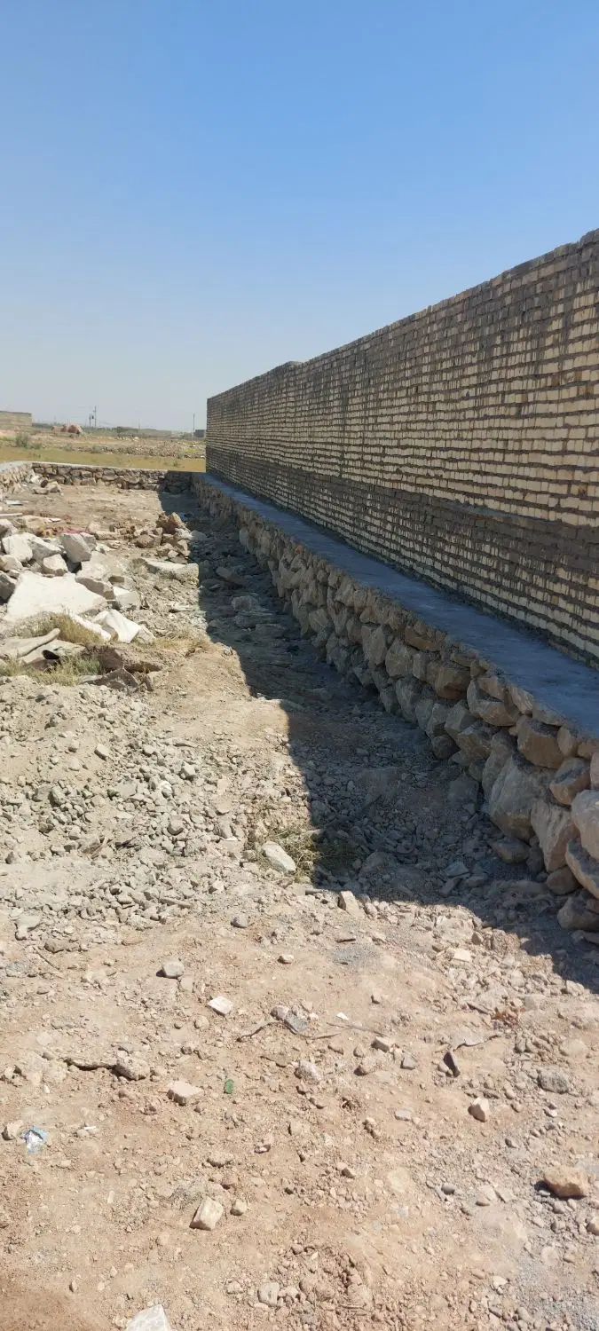 زمین مسکونی کوی گلدشت سنگ کاری شده