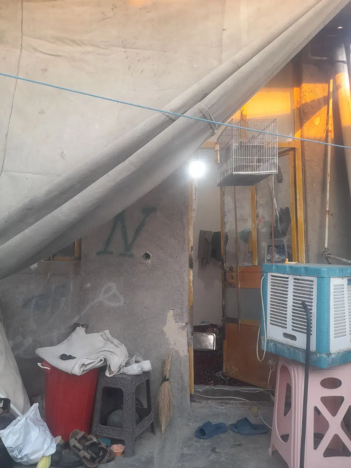 خانه مسکونی تک برگ سندصحنه بالاجوب