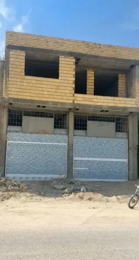 یک مغازه 50متری ویک  خانه150متری بالای مغازه