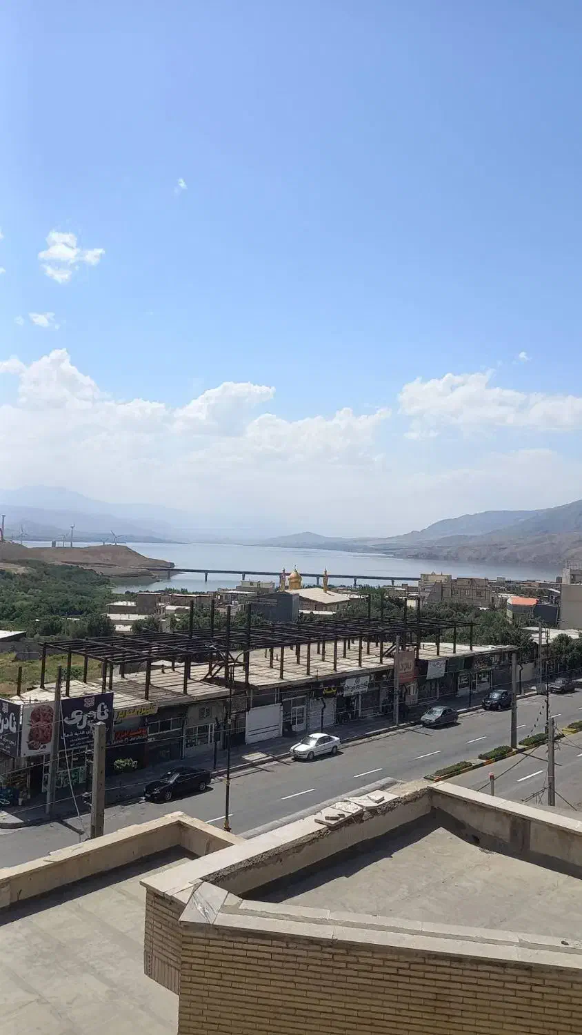 یک واحد اپارتمان و دوباب مغازه در منجیل