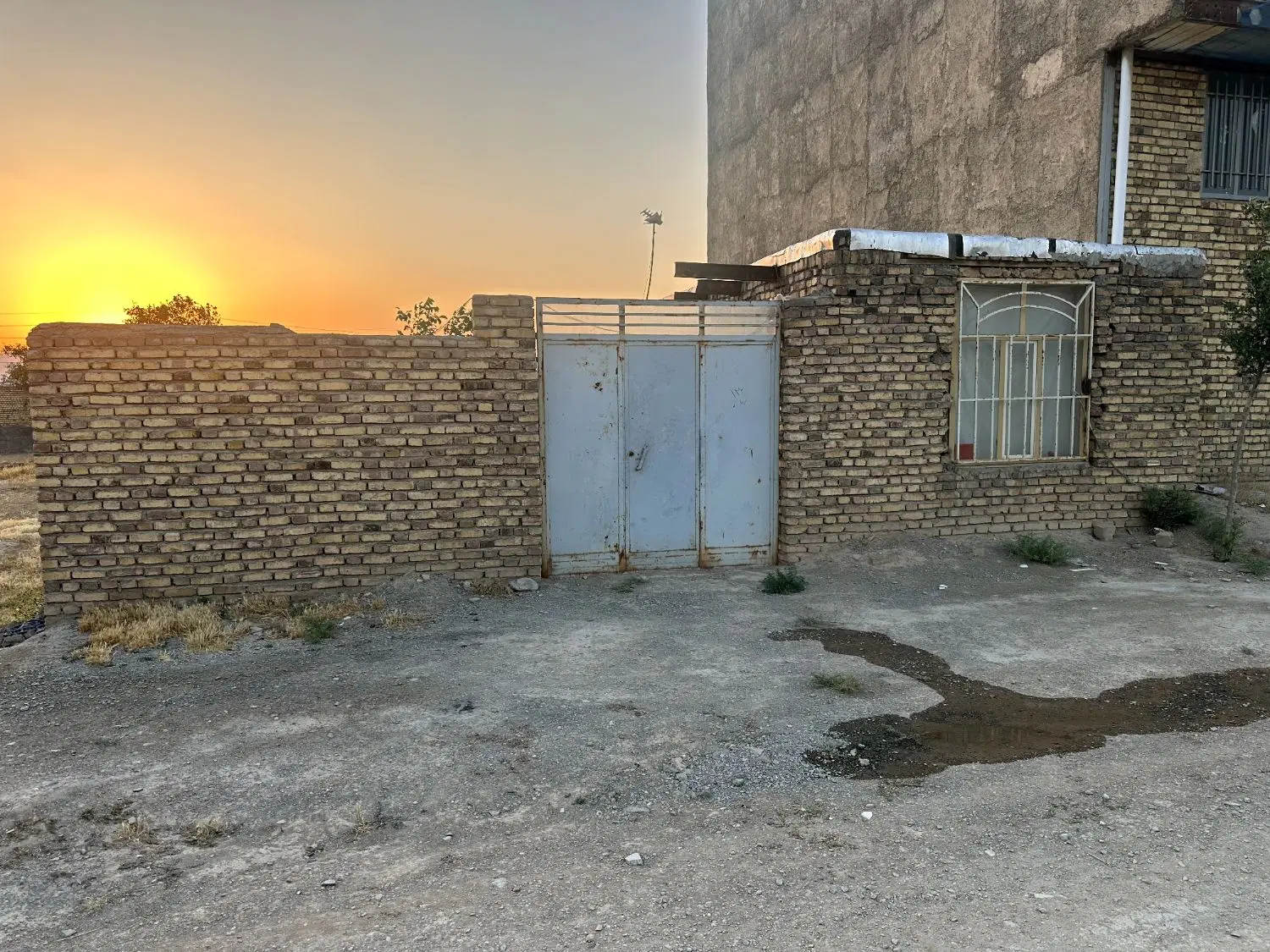 زمین در قانیاروق سفلی جاده بغل پمپ بنزین آپادانا