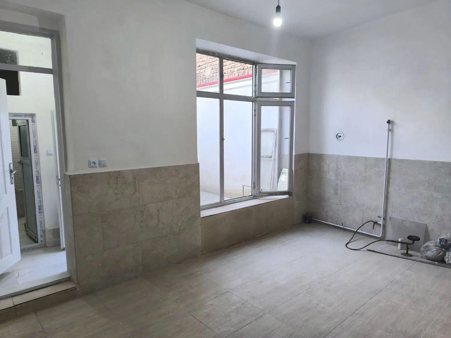 حیاط ۵۸ متر، بهار، میلانی (املاک ارک)