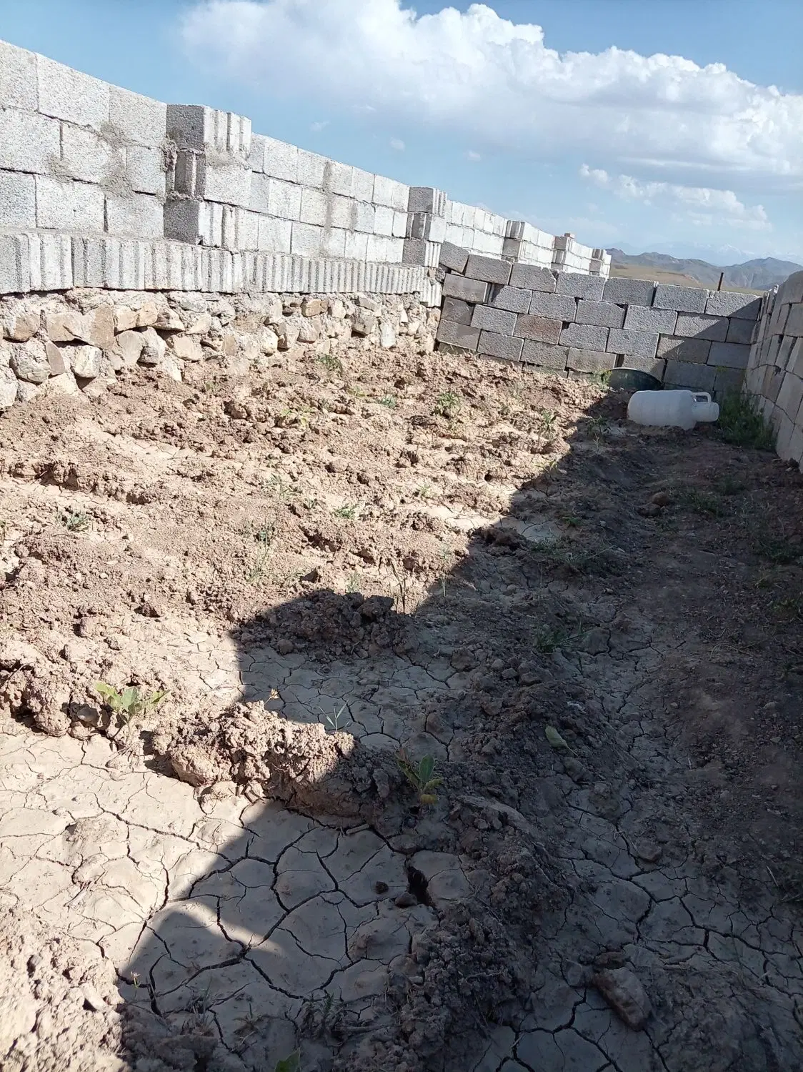 زمین باغی نیمه حصار شده در آقداش اسپیران
