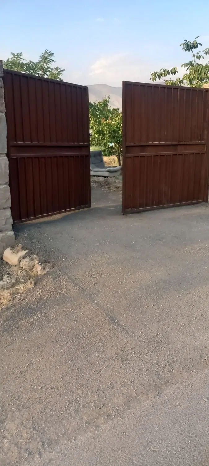 باغ وزمین دماوند گیلاوند بر اسفالت