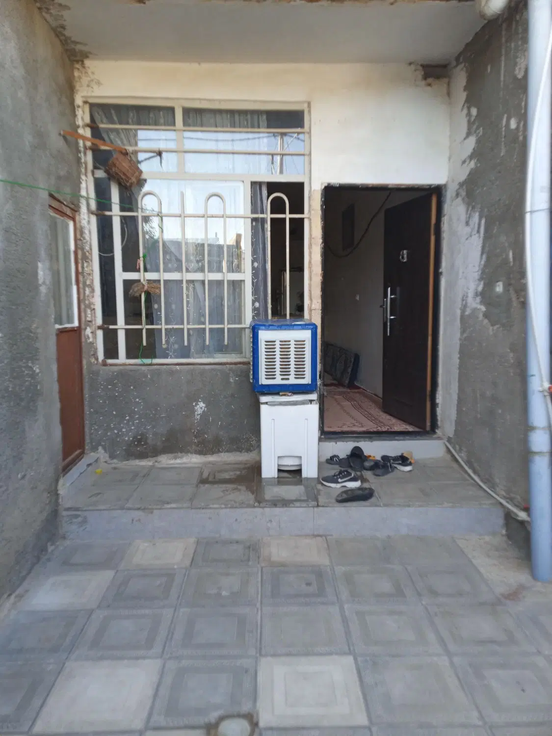 خانه ۱۱۰ متری حیاط ماشین رو میلان ۱۰ متری