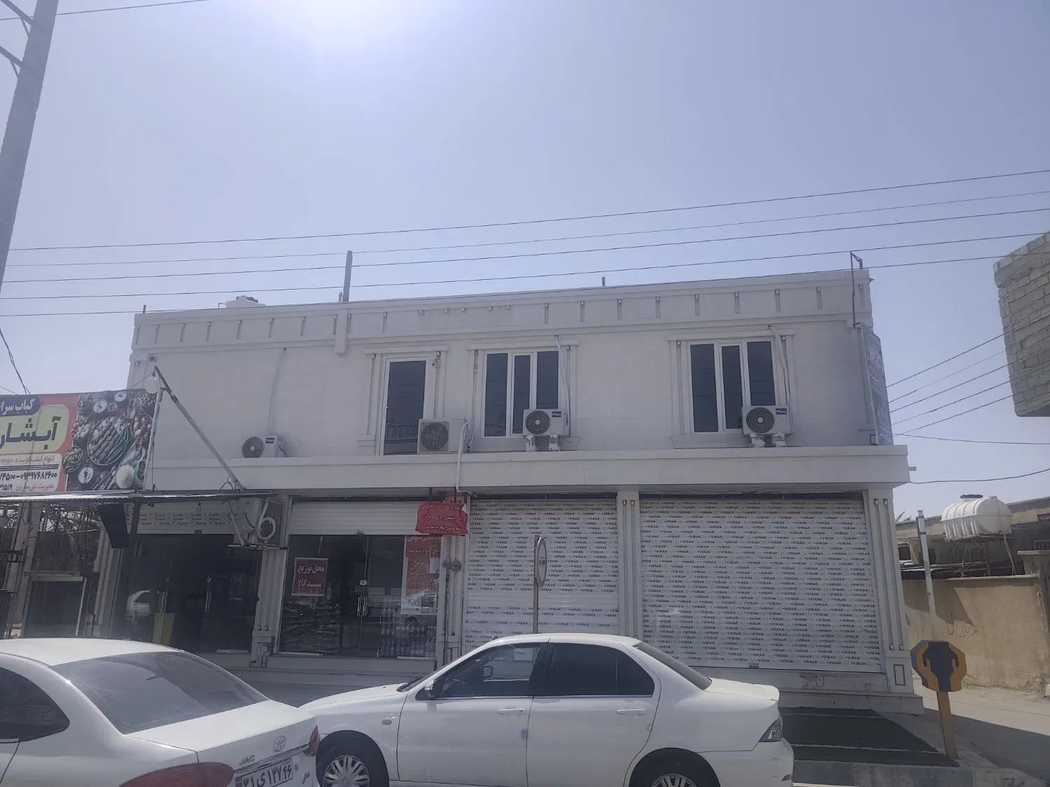 سلام 3دهنه مغازه64متراژو32متر منزل بالای مغژ 73