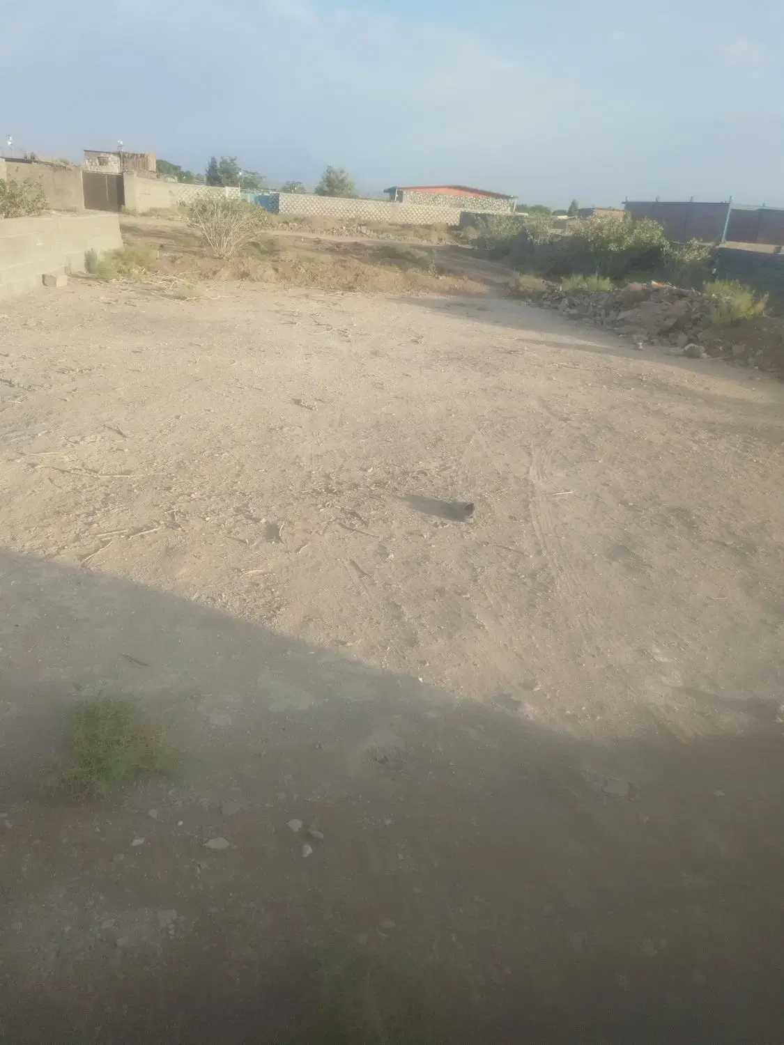 زمین درشیشگر
