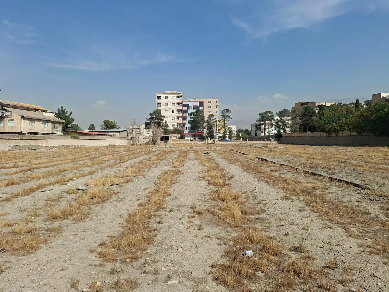 زمین چهار دیواری بایر 7265 متر مربع