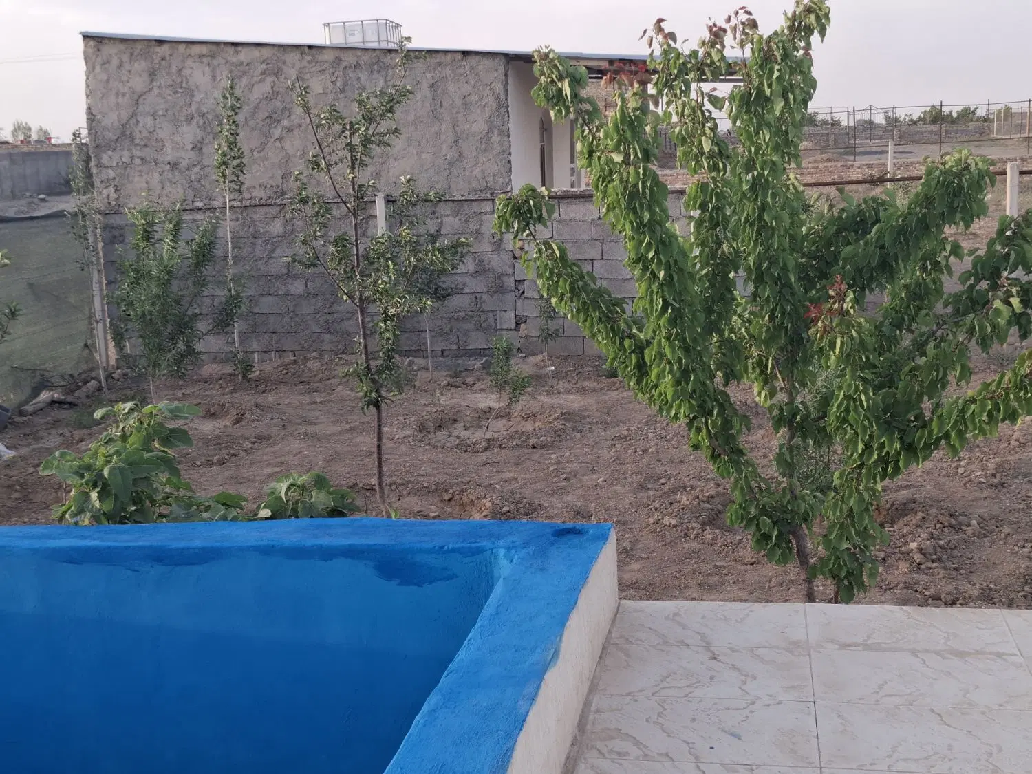 فروش باغ گاوخانه نزدیک اسفالت زیر پل نیمه کاره