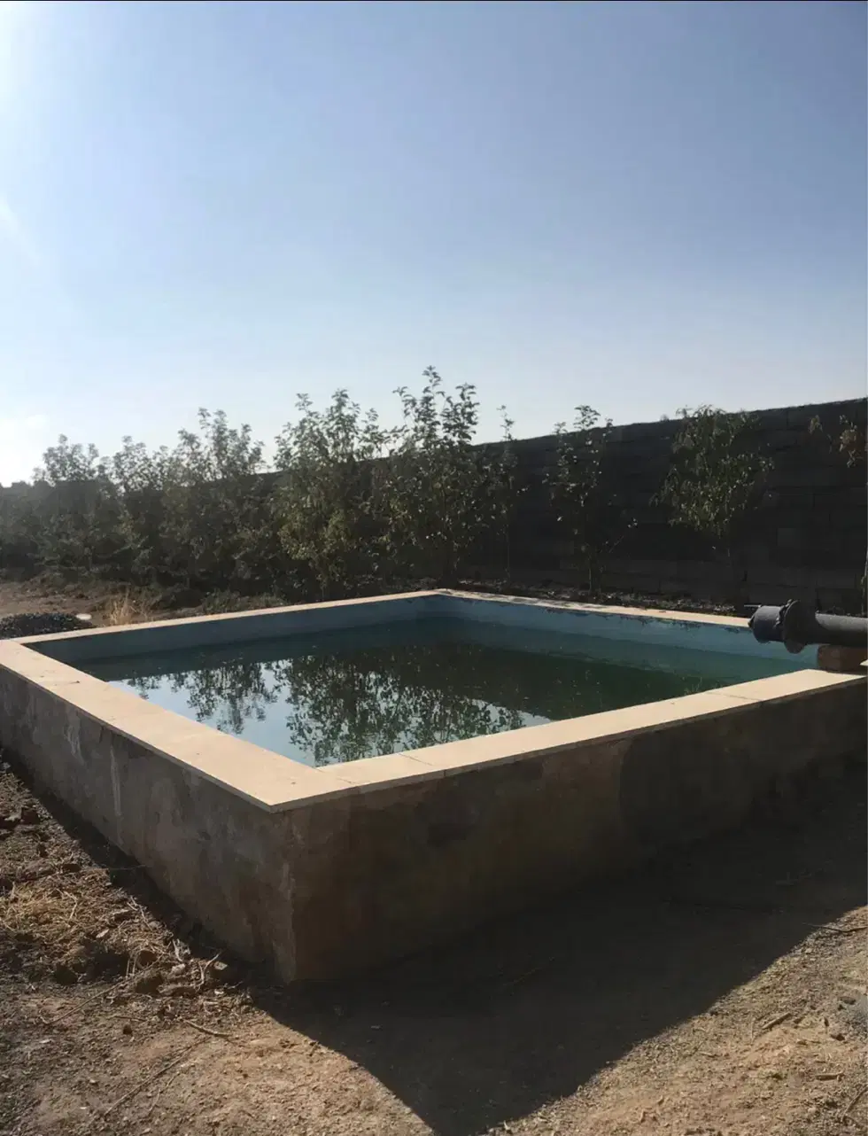 چهار دیواری  باغ با درختان میوه با مجوز ساخت و برق