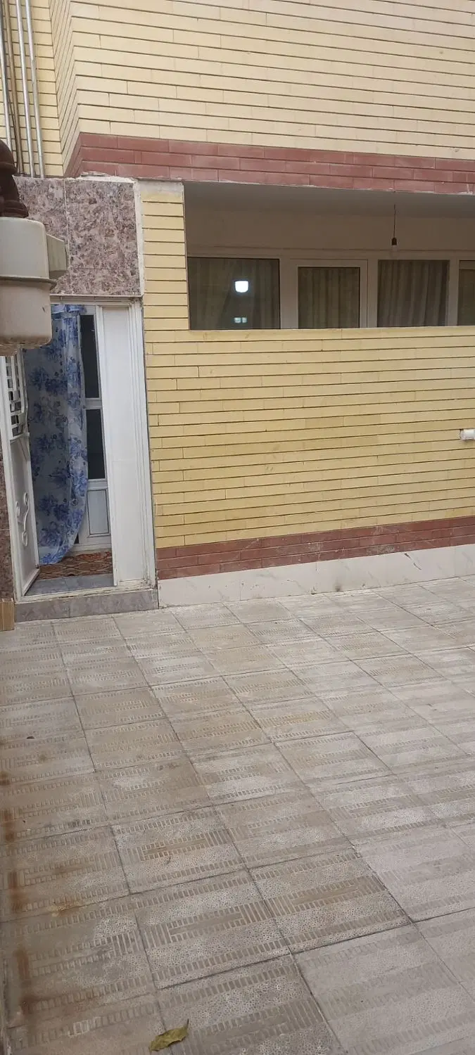 آپارتمان همکف ملل متحد سمت چای کنار