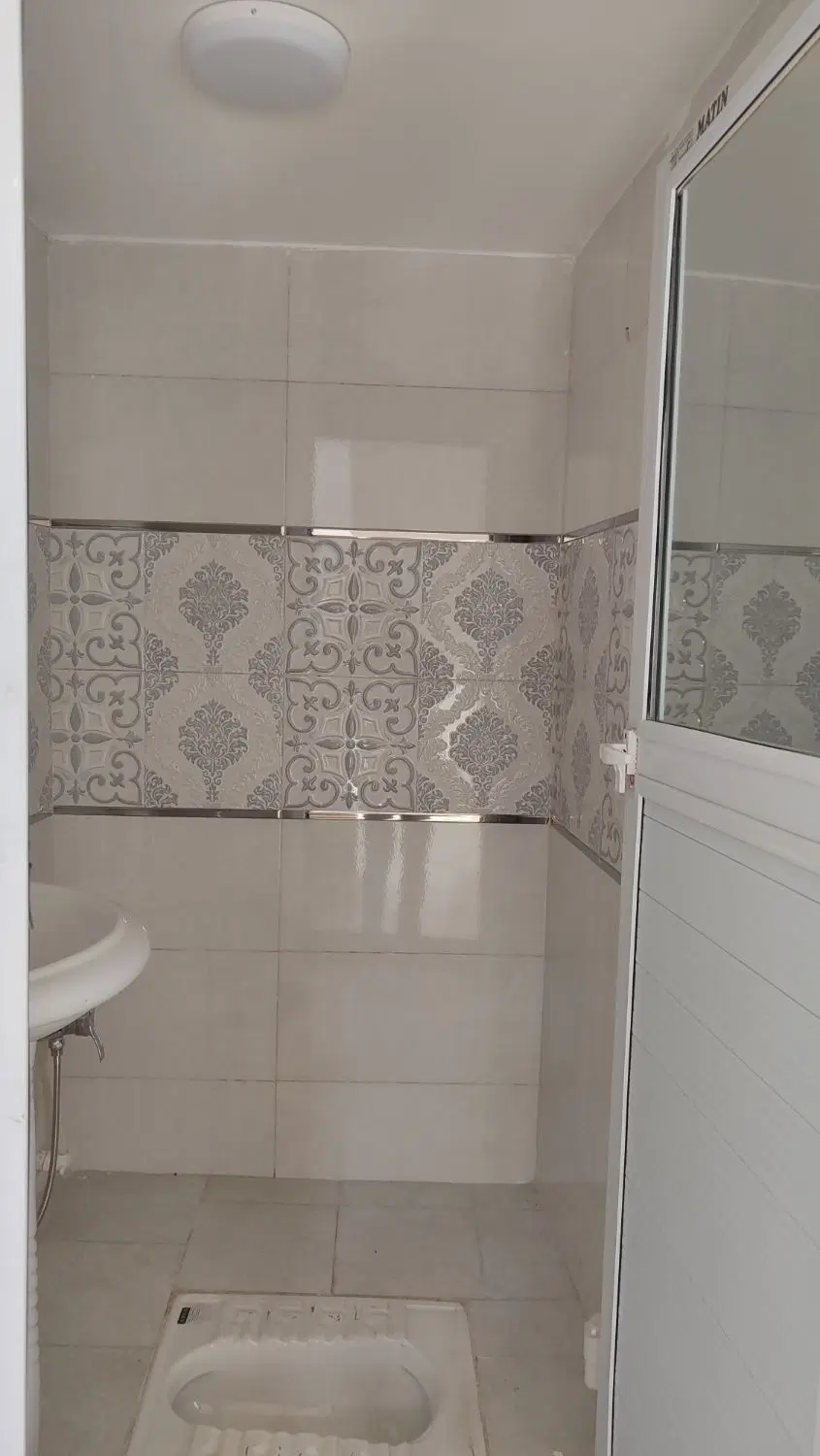 حیاط ۹۵ متری دو طبقه در آخونی شریفی