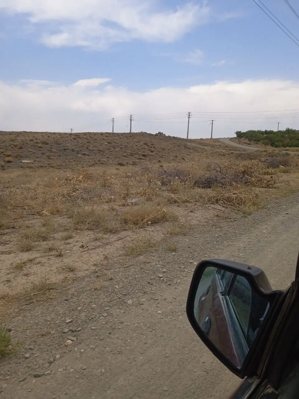 زمین کشاورزی شهر یانچشمه کنار اسفالت