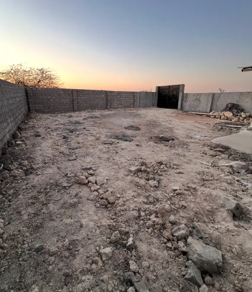 زمین مسکونی درگهان با دیوار کشی نزدیک جاده