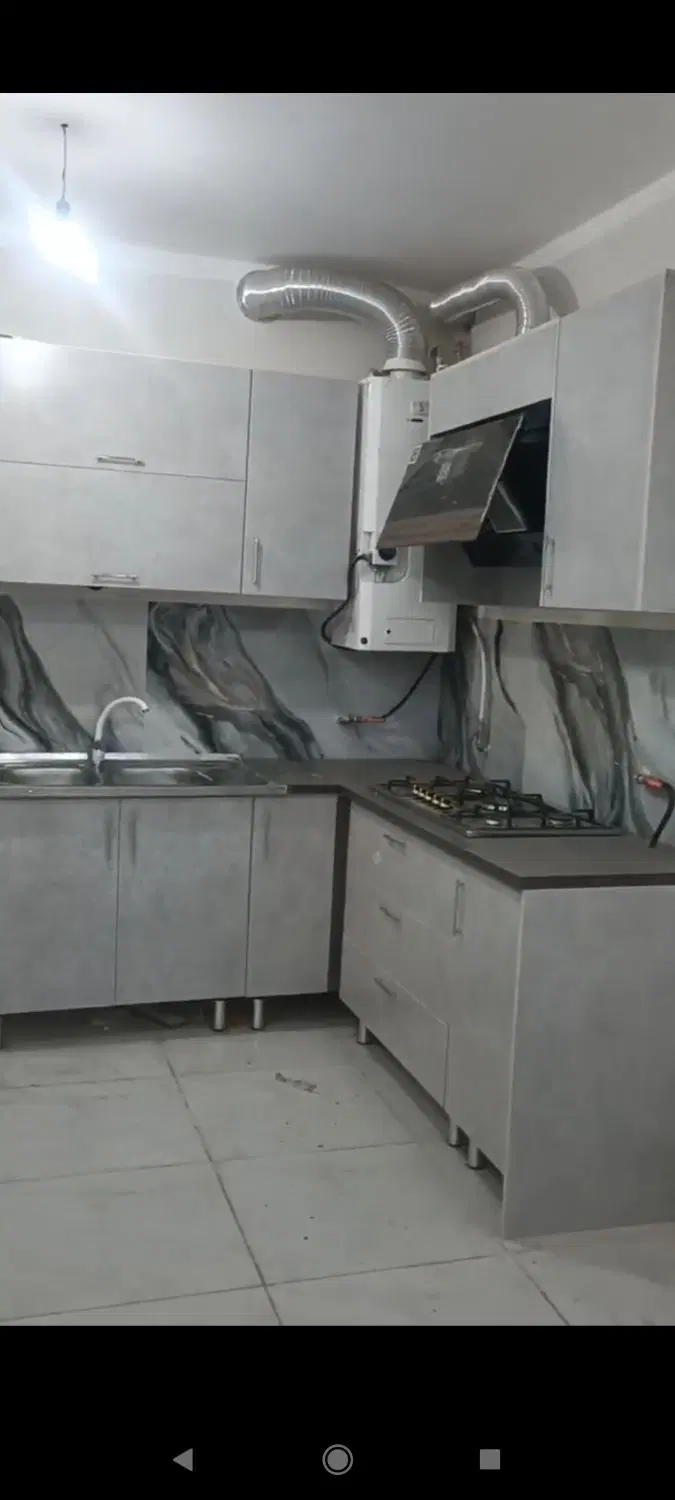 یک واحد آپارتمان همکف رهن اجاره 450با15میلیون