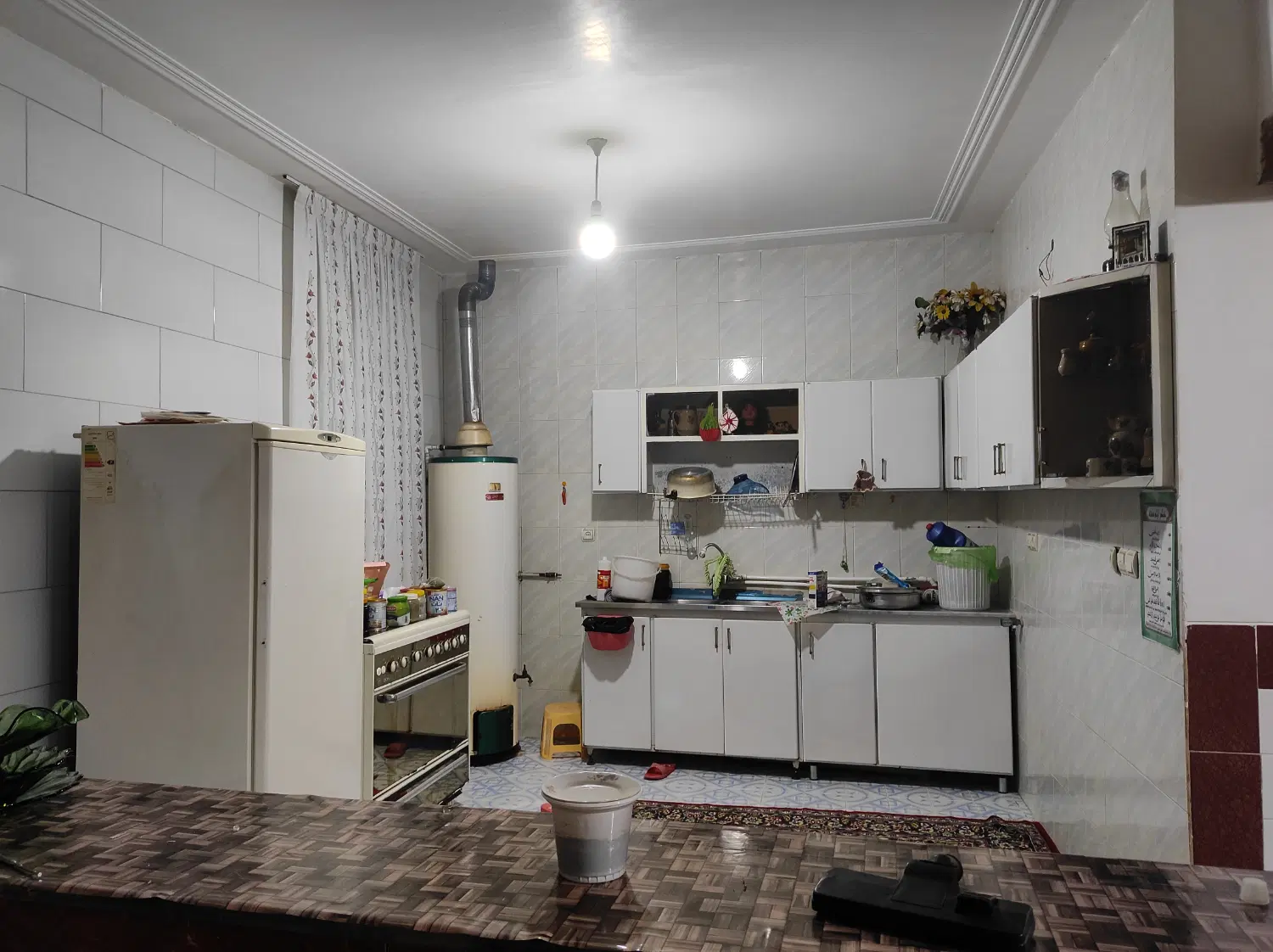 یک باب منزل مسکونی واقع در خیابان وحدت