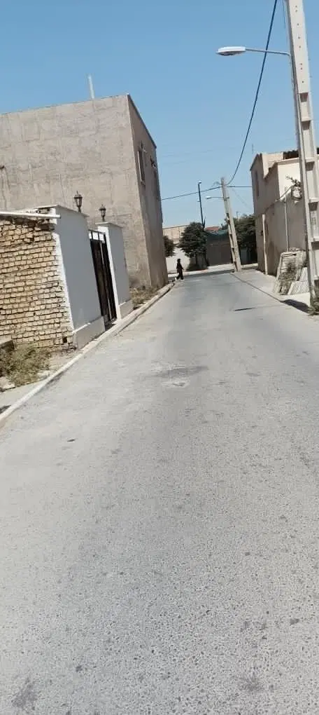 زمین توی بافت سر کوچه معلم آبباریک