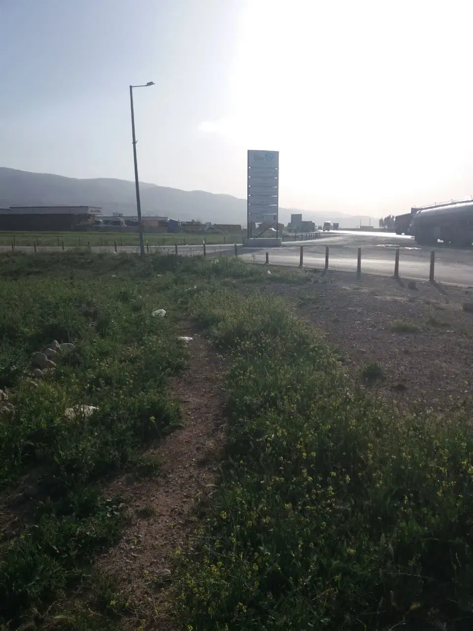 فروش زمین تجاری کمربندی دونبش جنب پمپ بنزین میرزای