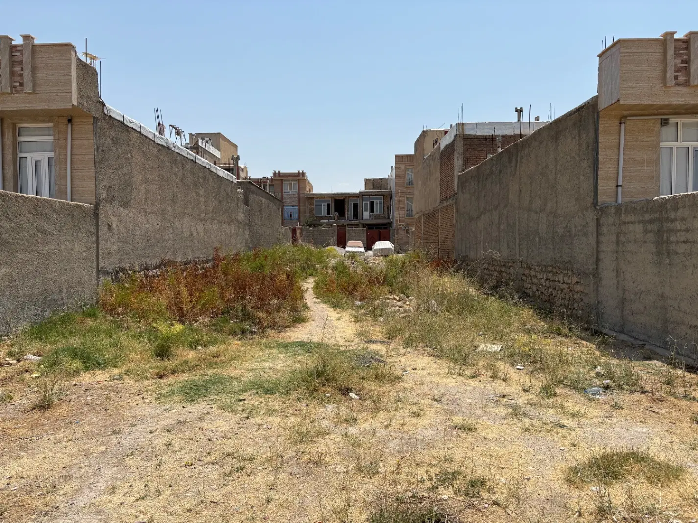 زمین تجاری مسکونی خیابان ۳۲ متری