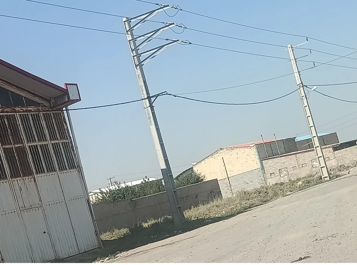مغازه و زمین  در بر شهرک الوارسفلی