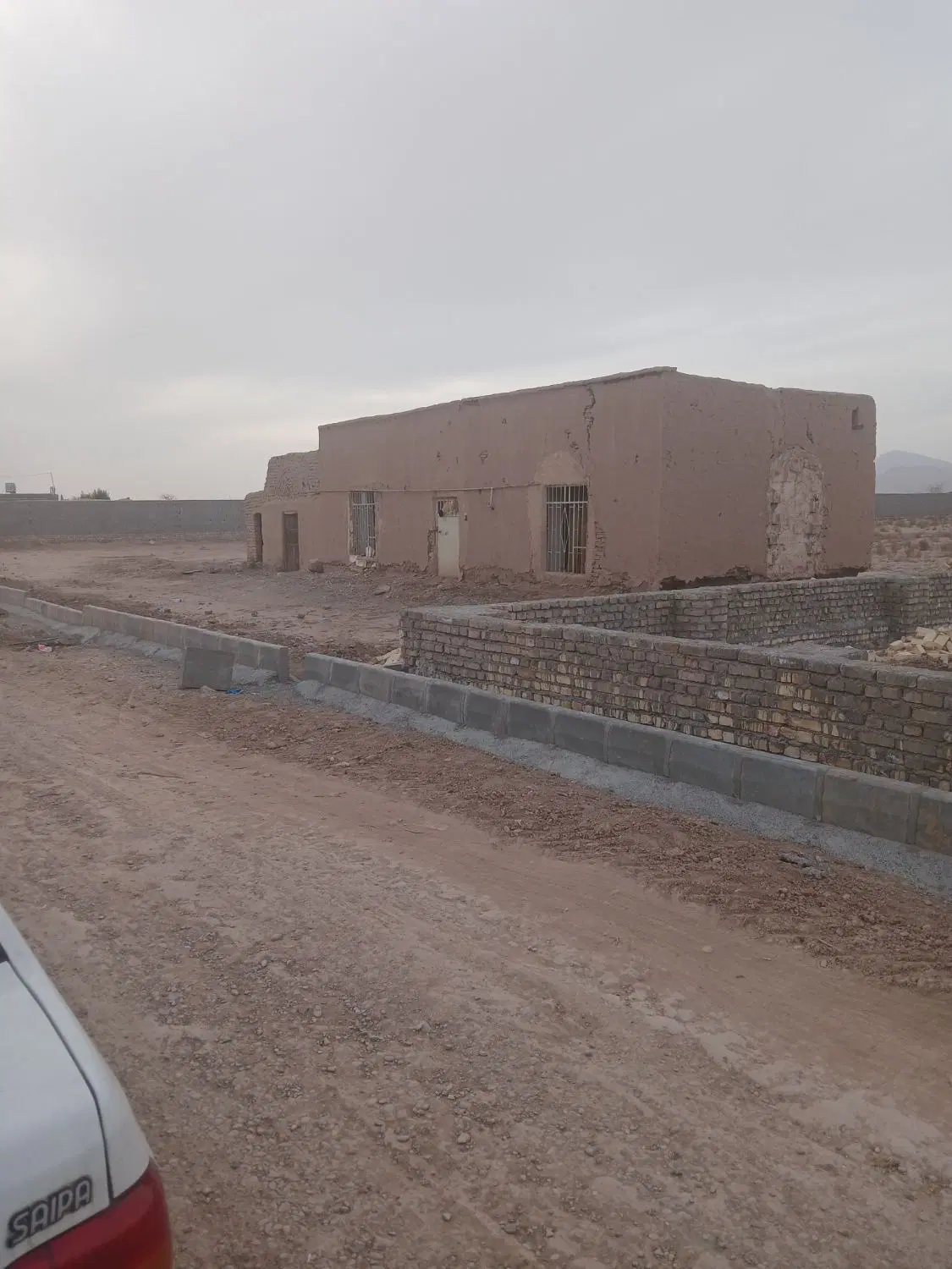 زمین مسکونی با خانه سند تک برگ زیر قیمت منطقه