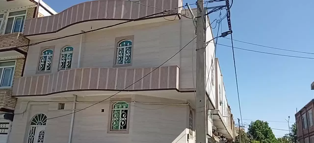 خانه دو طبقه دو نبش با مغازه بلوار ولیعصر
