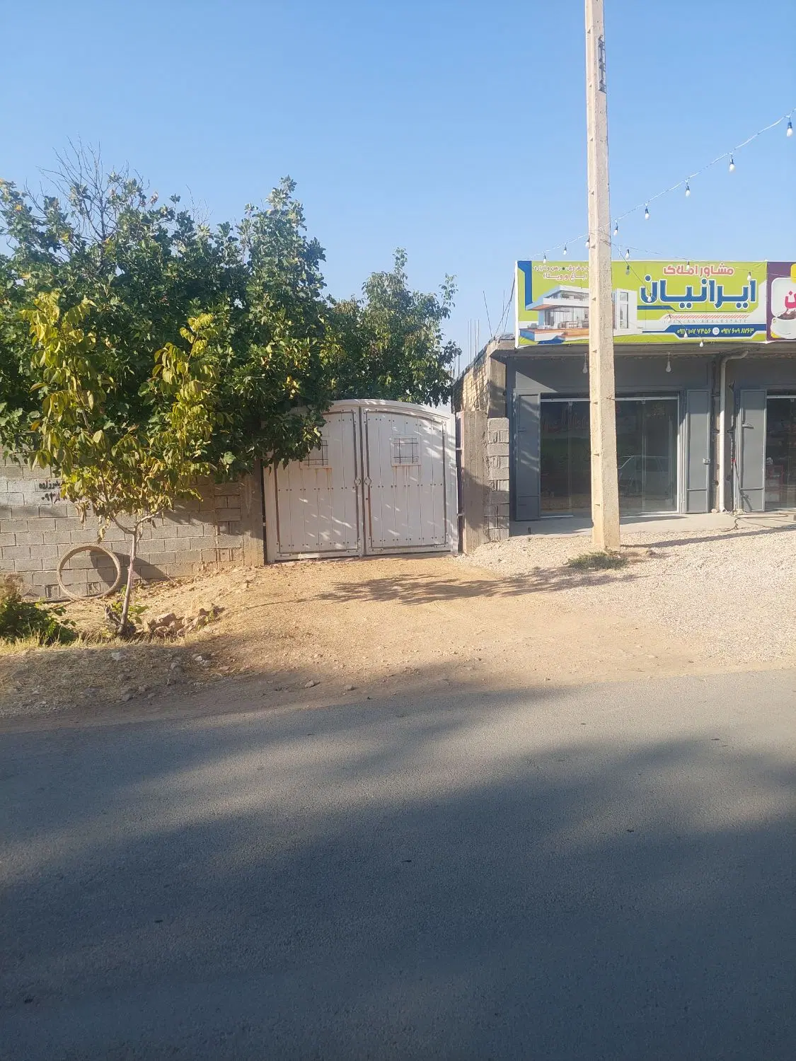 باغشهری 1000متری با درختان 20 ساله گردو در ملوسجان