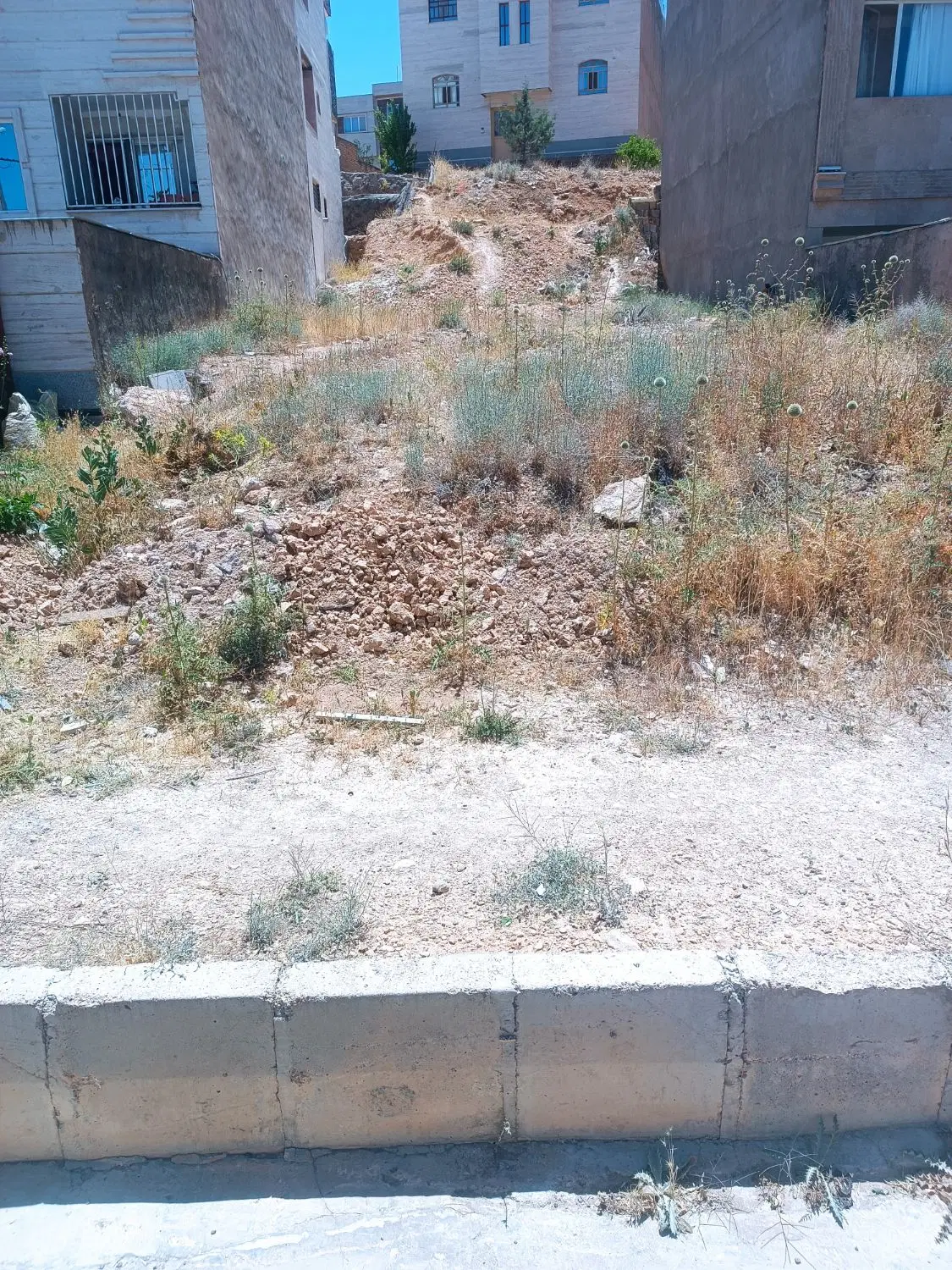 مشارکت در ساخت زمین تجاری مسکونی