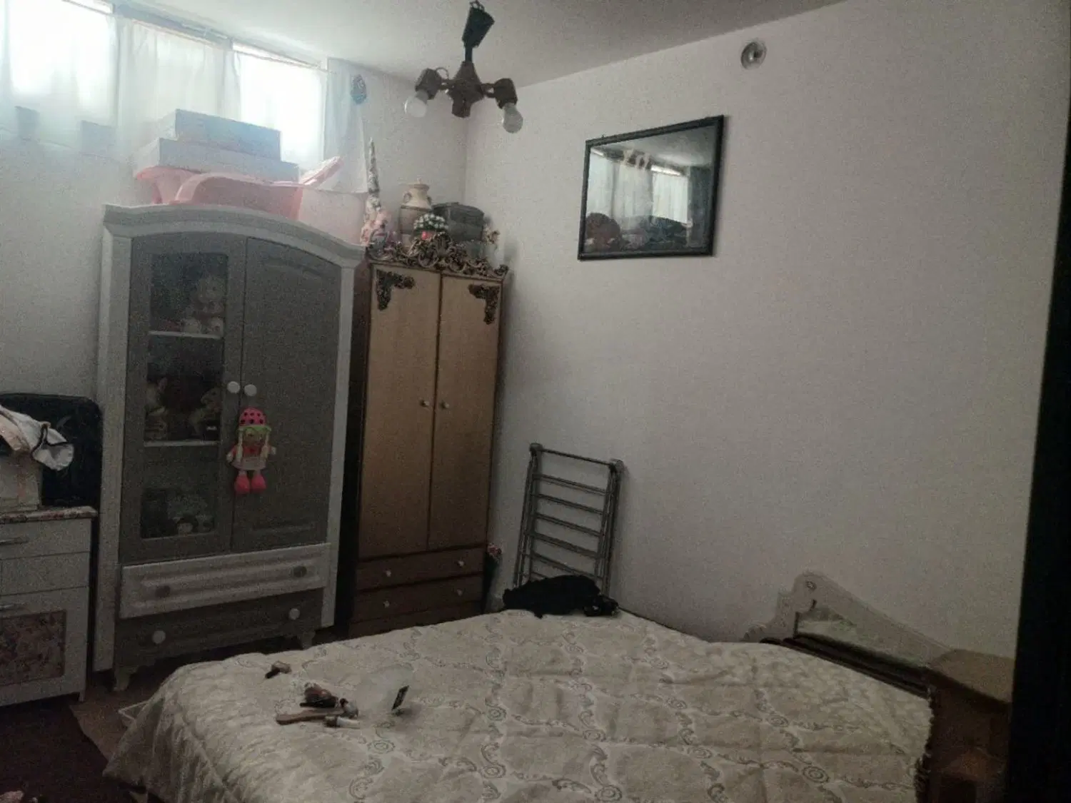 معاوضه منزل دوطبقه با منزل یک طبقه حیاط دار