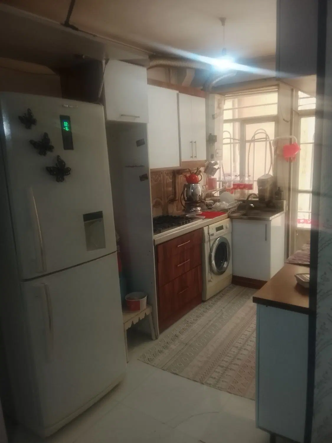 آپارتمان طبقه همکف 90مترباپارکینگ  دو خواب