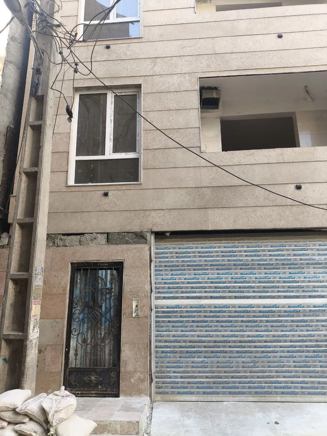 آپارتمان نعمت اباد تک واحدی