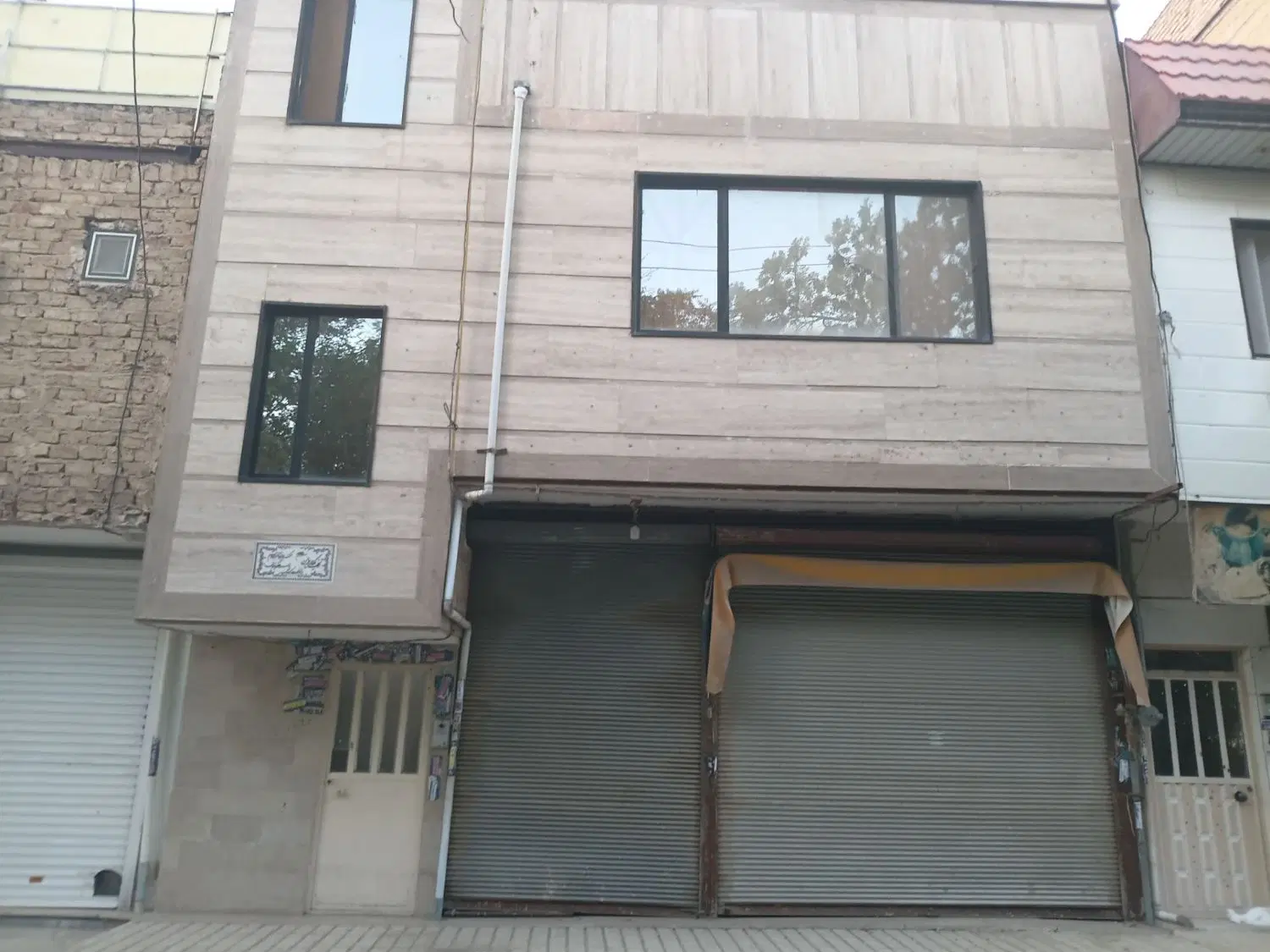 منزل مسکونی و مغازه