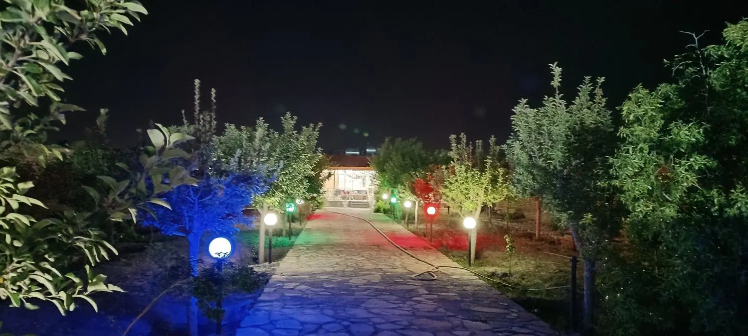 فروش باغ ۱۰۰۰ متری دارای بنا و درختان میوه ۱۵ ساله
