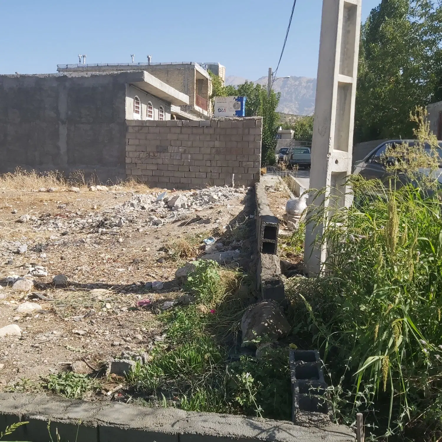 زمین مسکونی مادوان بین دوجاده