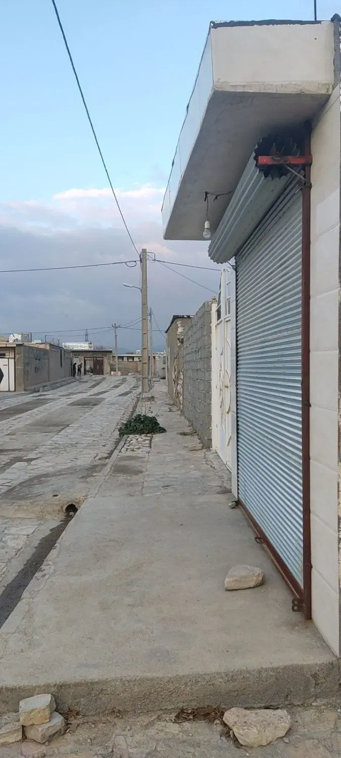 خانه ویلایی همراه مغازه بیستون روستای فراش