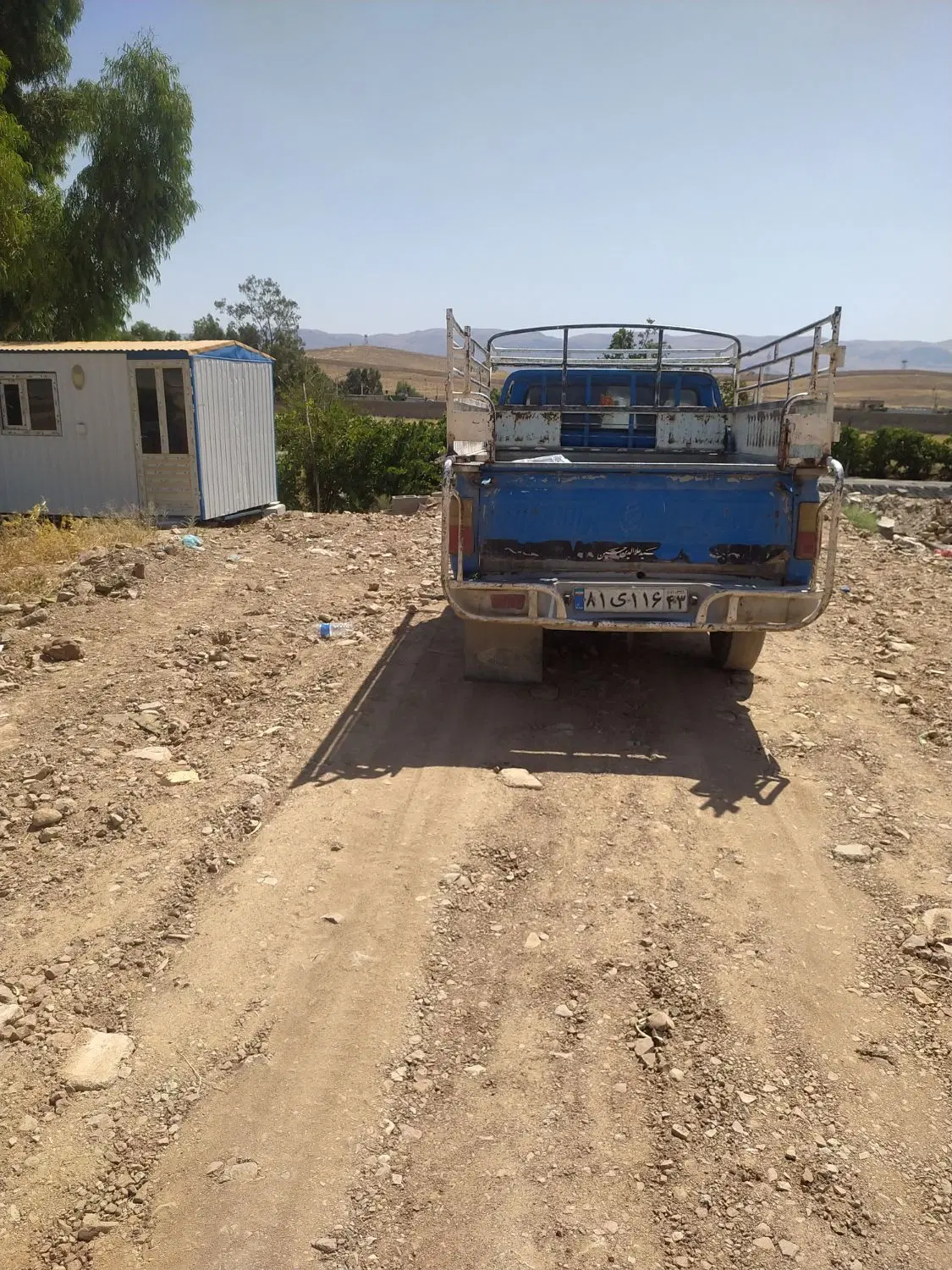 زمین رو به روی شهرک گلها