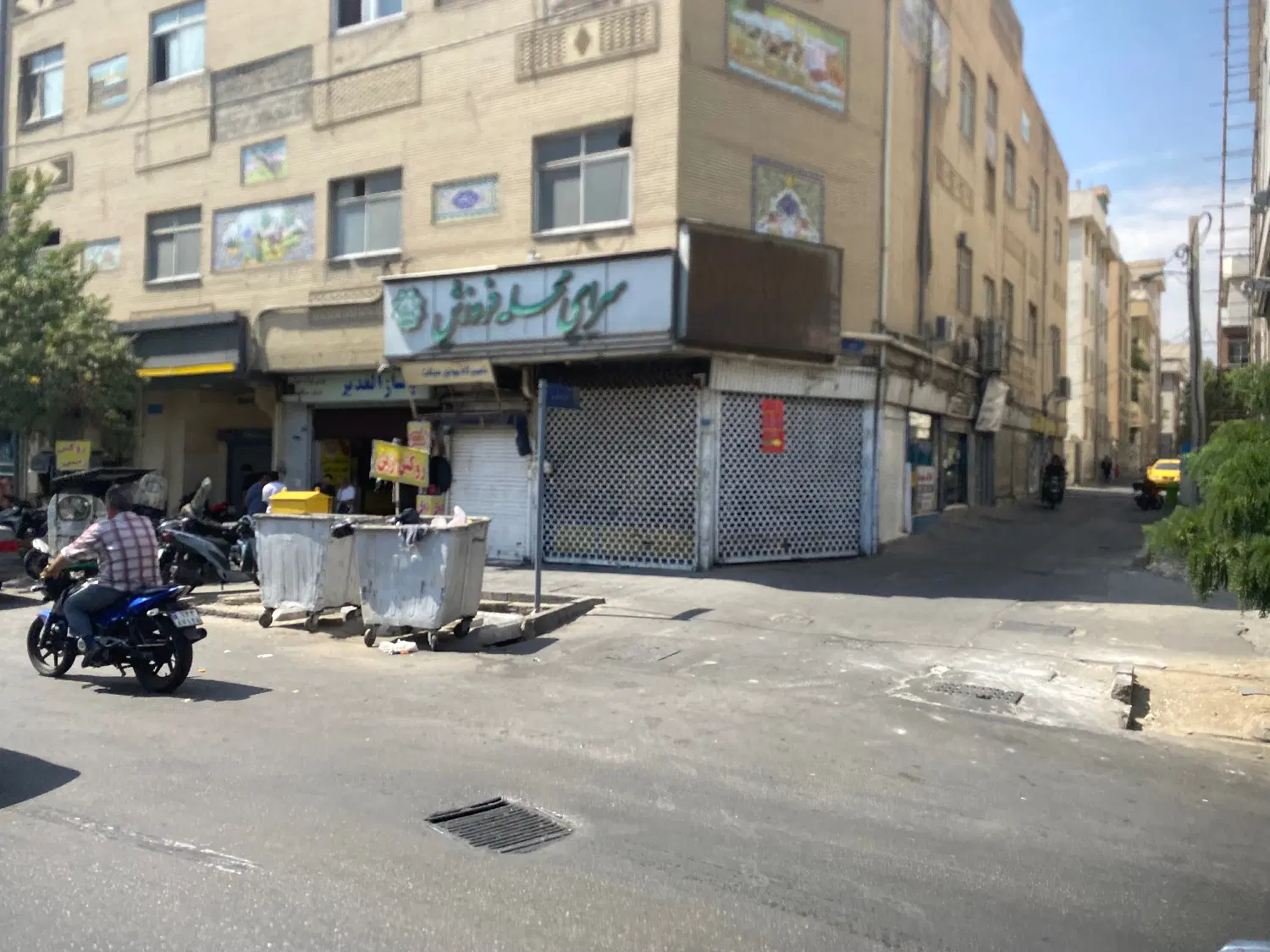 مغازه بر مولوی و گمرک نبش کوچه