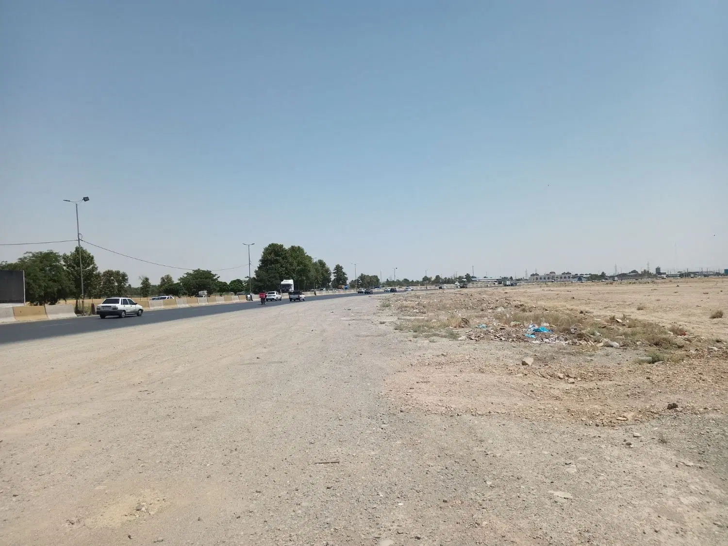 زمین 3 هکتار بر جاده احمداباد مستوفی