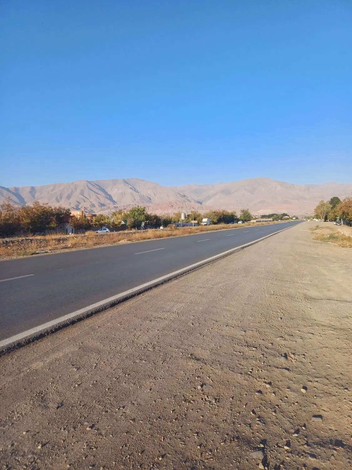 ۵۰۰متر زمین باغی جاده باغرود