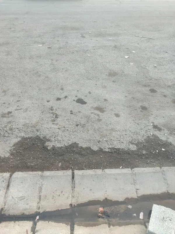 زمین بر جاده باسمنج نزدیک میدان تره بار دو کله