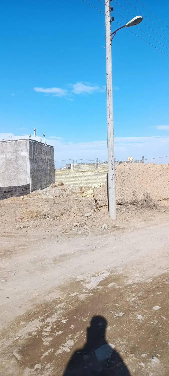 زمین پشت آپارتمان سیمان.زعفرانیه
