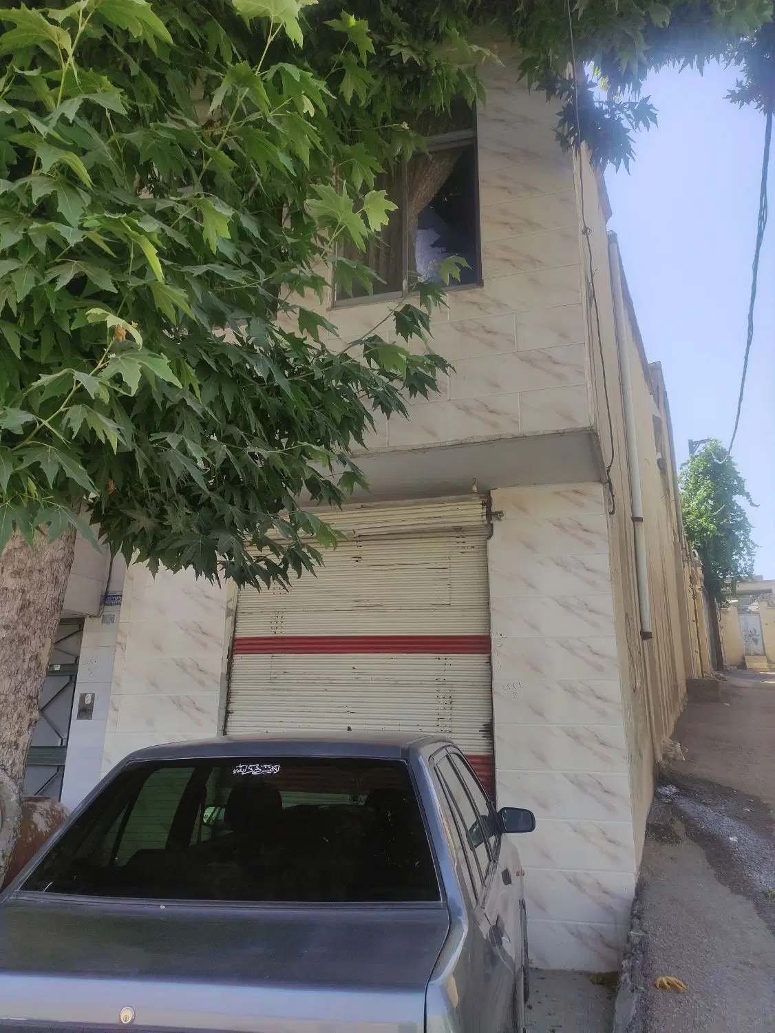 خانه ده مجنون با مغازه برخیابان ۴۵متری