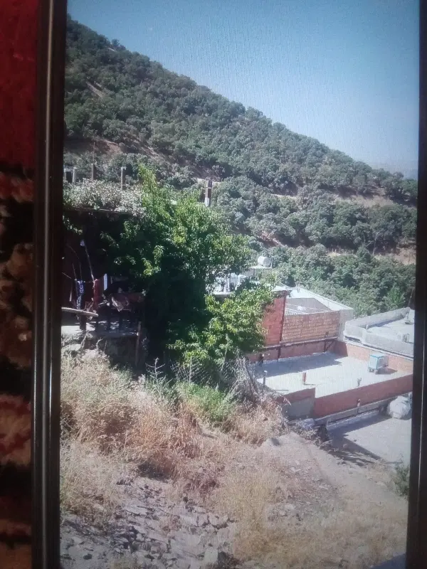 زمین پشت گلزارشهدا