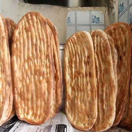 یک ملک تجاری مسکونی با یک امتیاز نانوایی دولتی