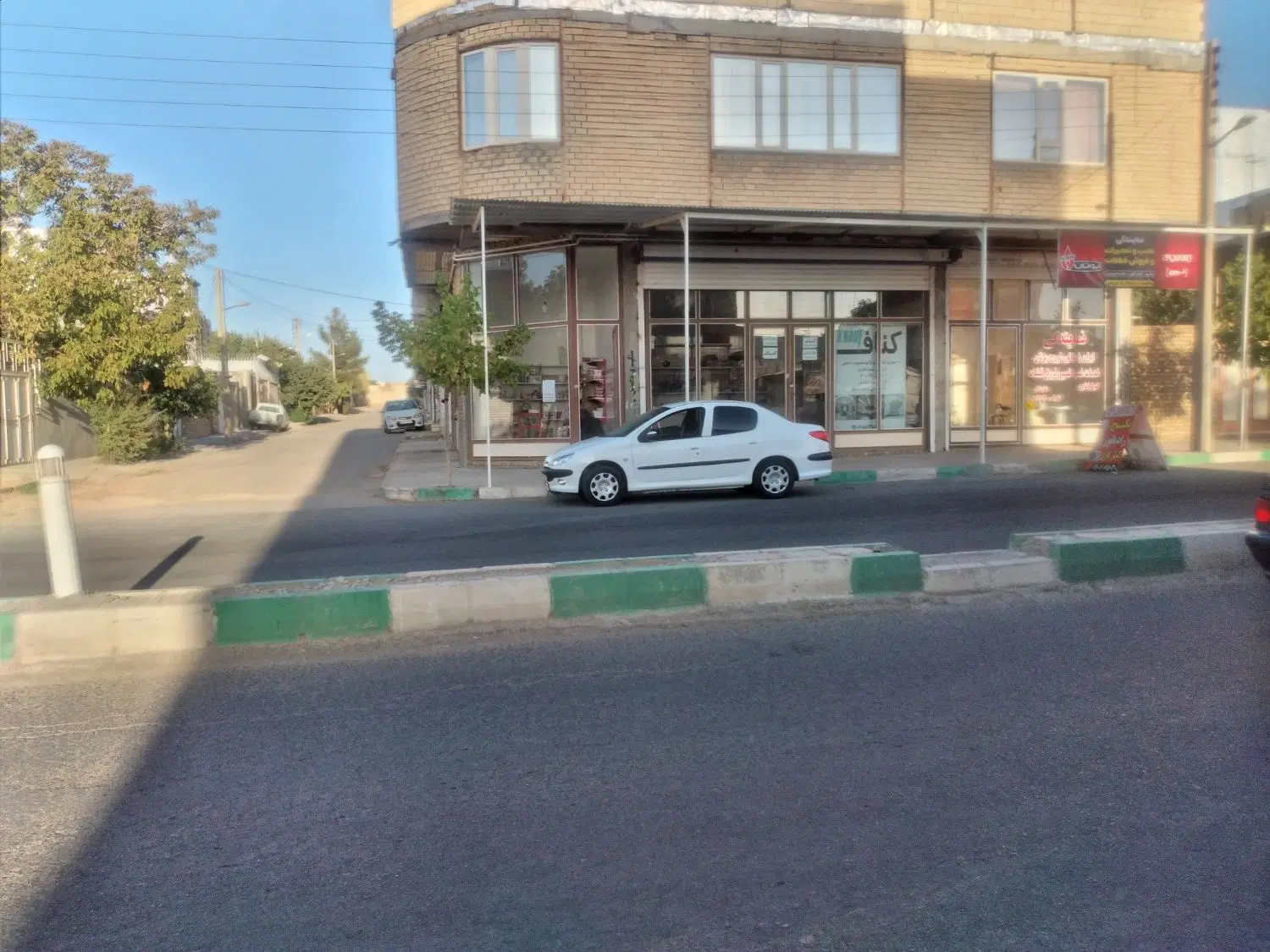 فروش ساختمان روی خیابان اصلی شهرک ولیعصر