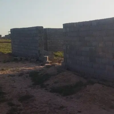 زمین دور دیوار بلوکه دومتری خادم آباد