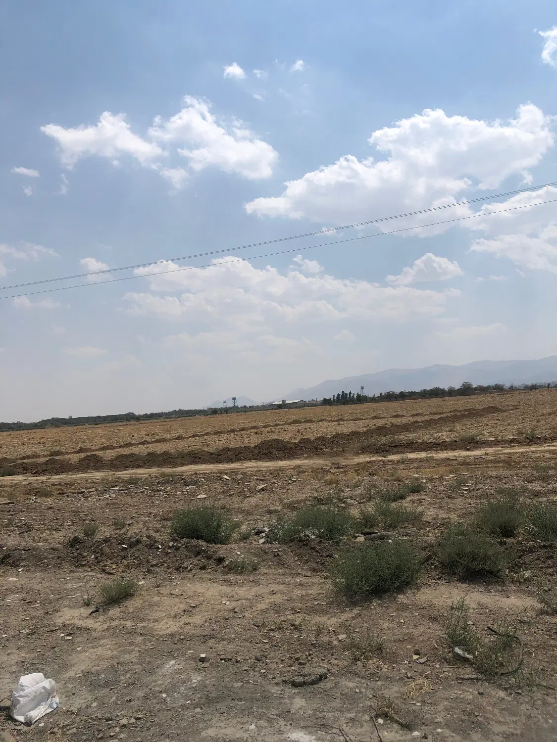 زمین ۸۰۰متر  جاده فراهان زیر پل