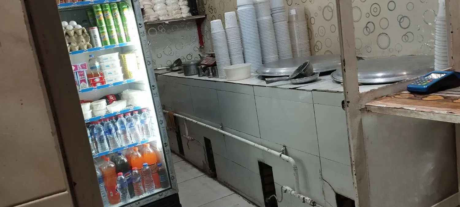 مغازه اش و حلیمی