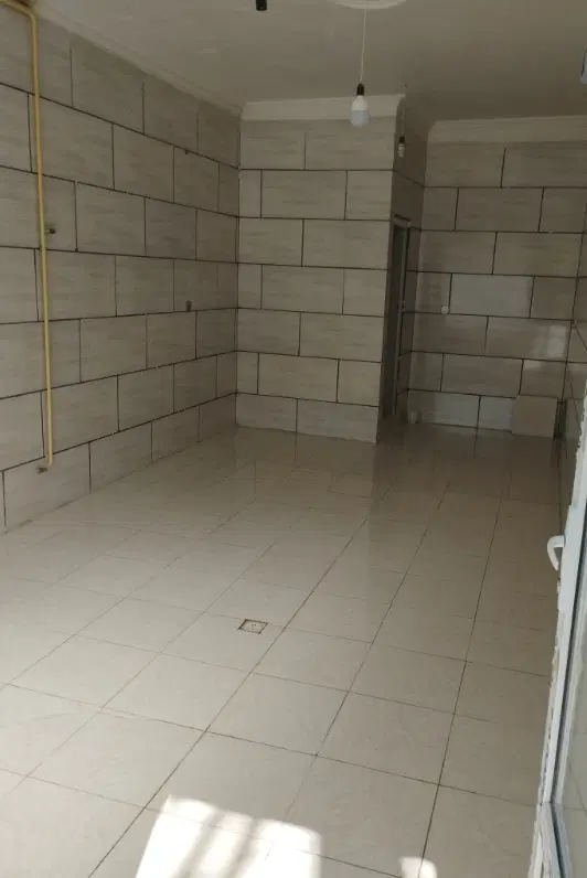 مغازه ۲۲ متری دوشان نزدیک جاده گرمیدر خیابان اصلی