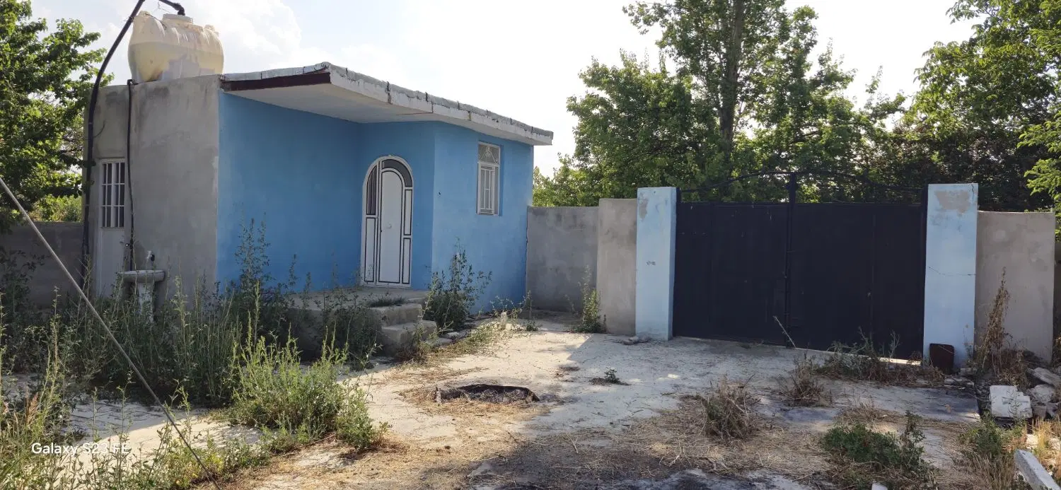 باغ با دیوارکشی و خانه مسکونی